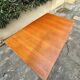 Scandinavian extendable dining table in teak veneer.