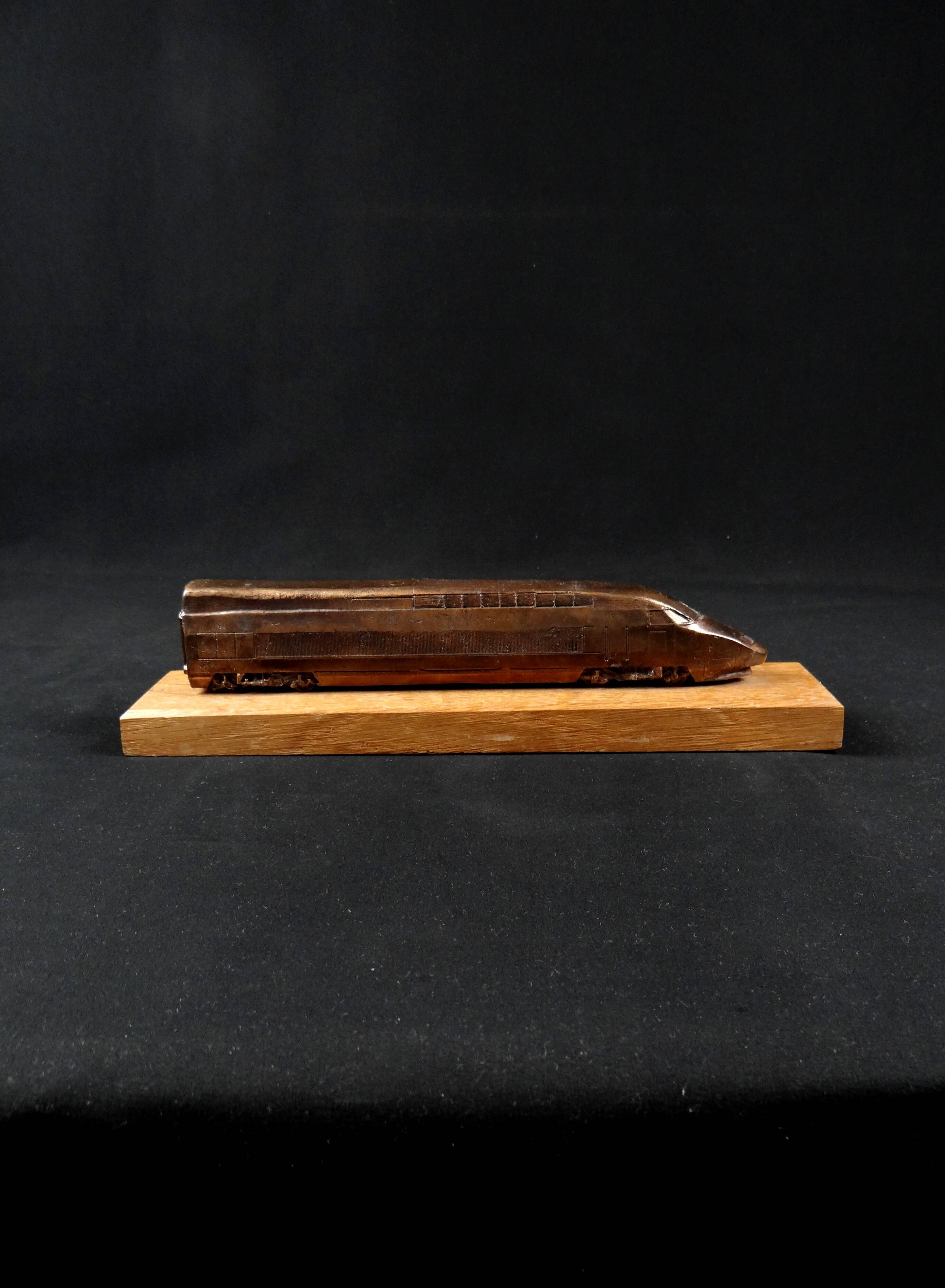 Bronze TGV on a wooden base, scale model of the TGV Sud-Est from the 1980s
