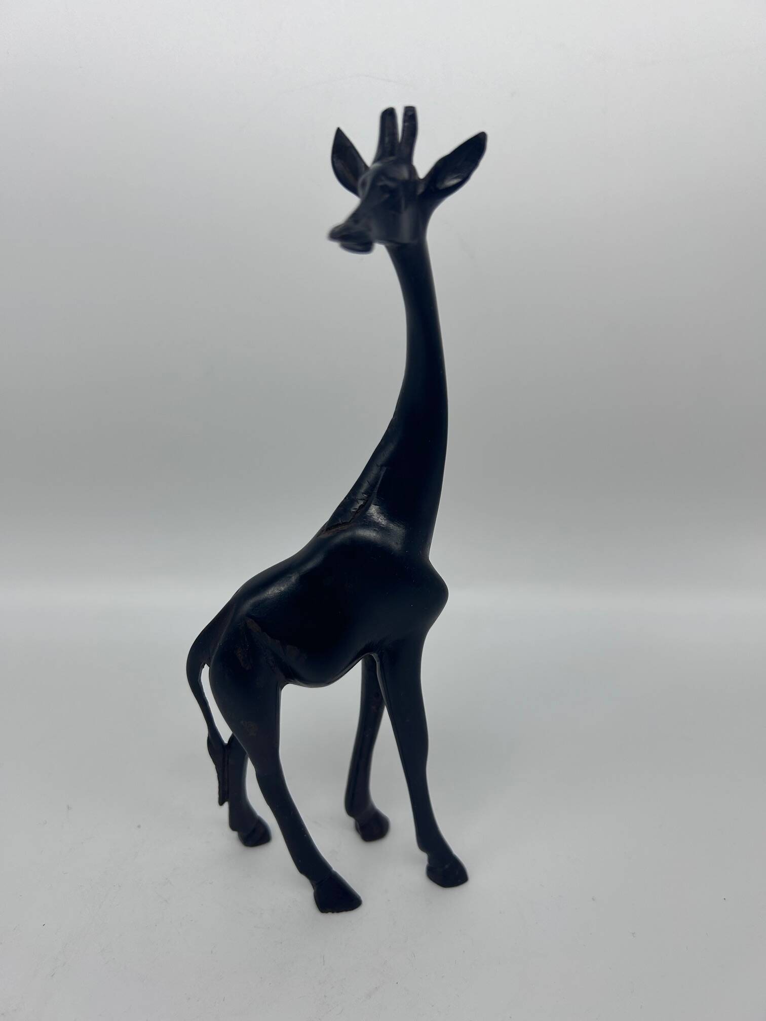 2 girafes en bois sculpté