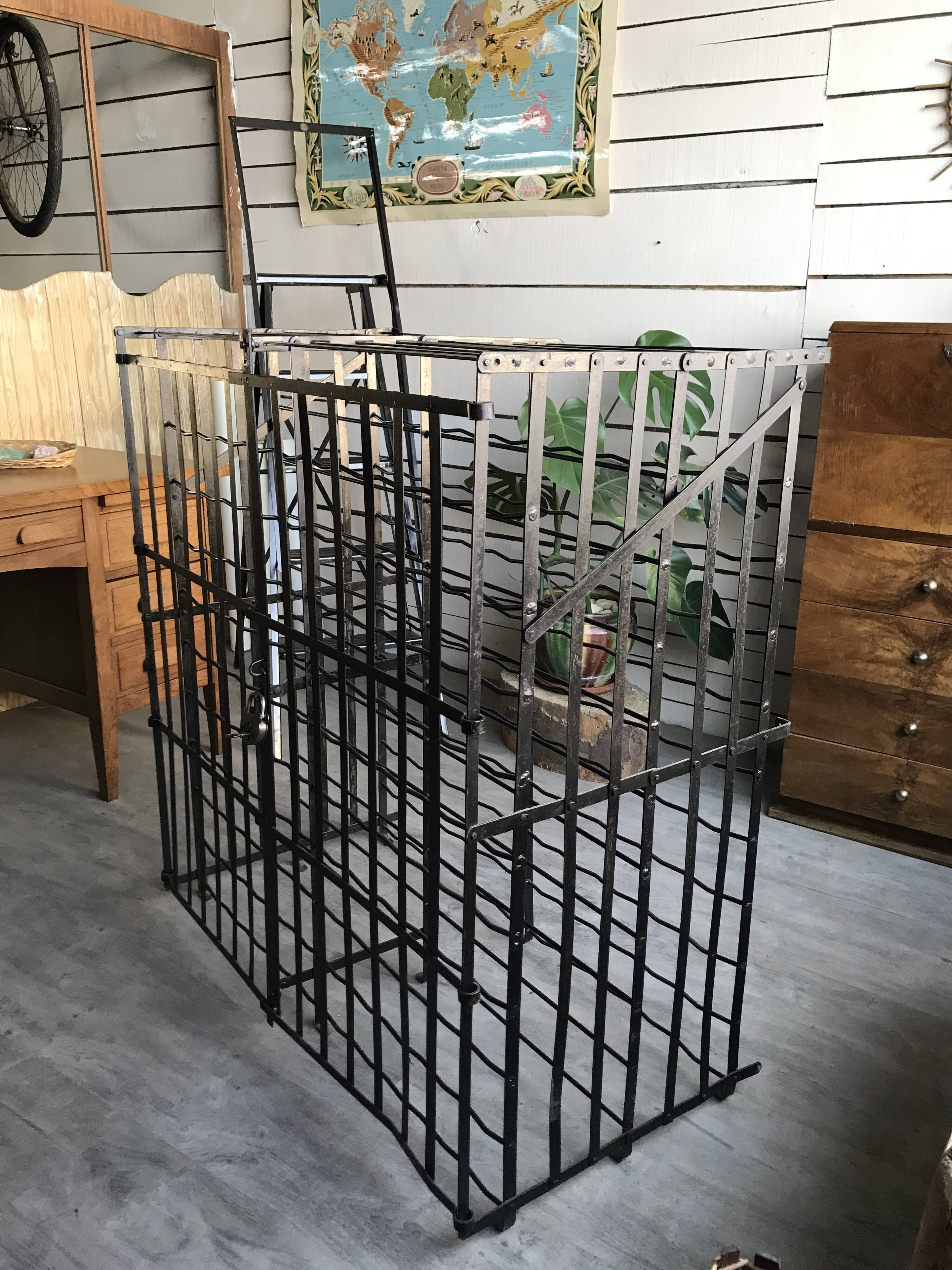 wine in metal cage wine cellar