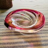 Empty pocket in pink tinted glass