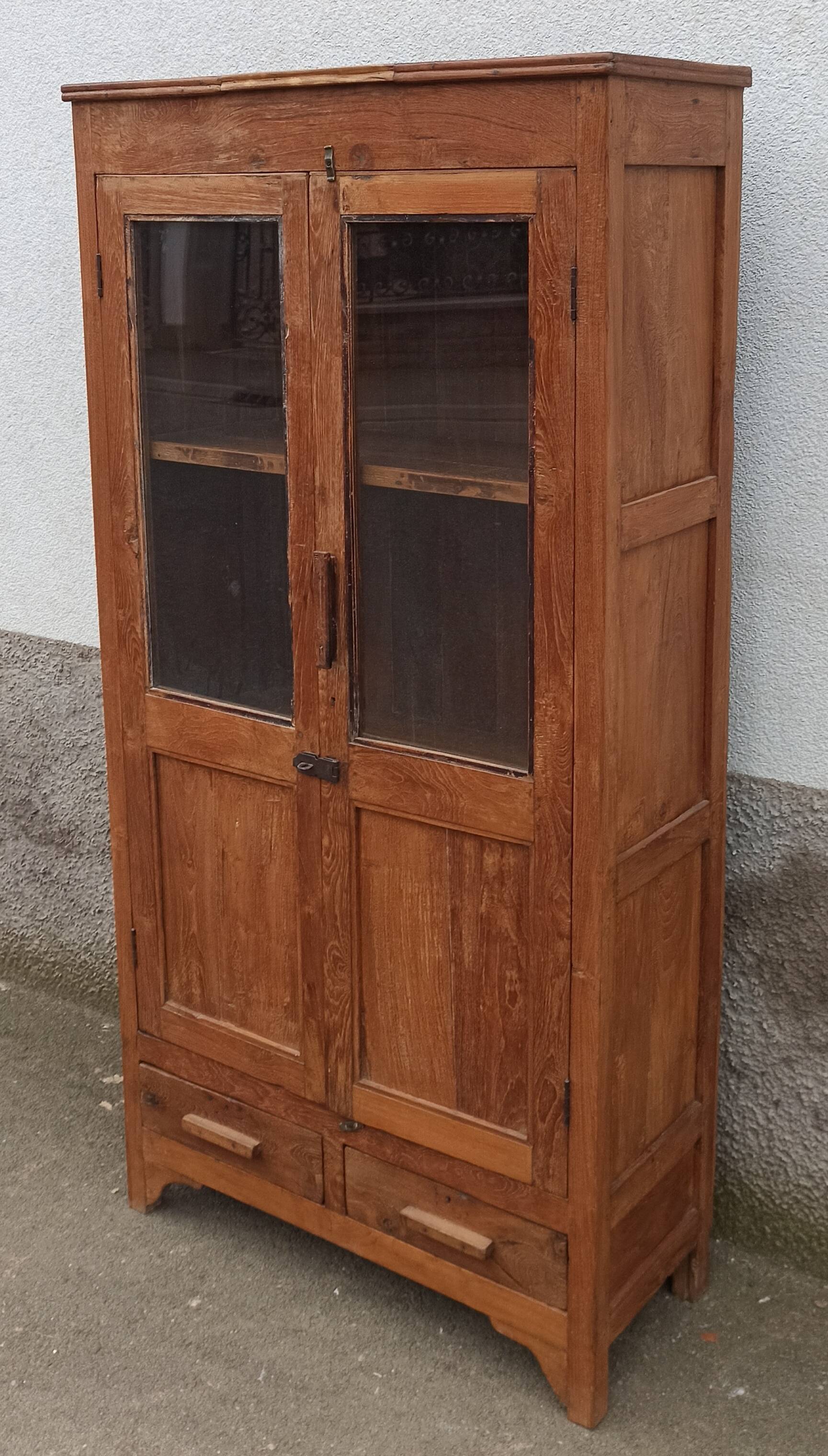 Old glazed teak cabinet