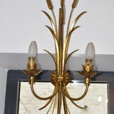 Golden metal wall sconce