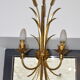 Golden metal wall sconce