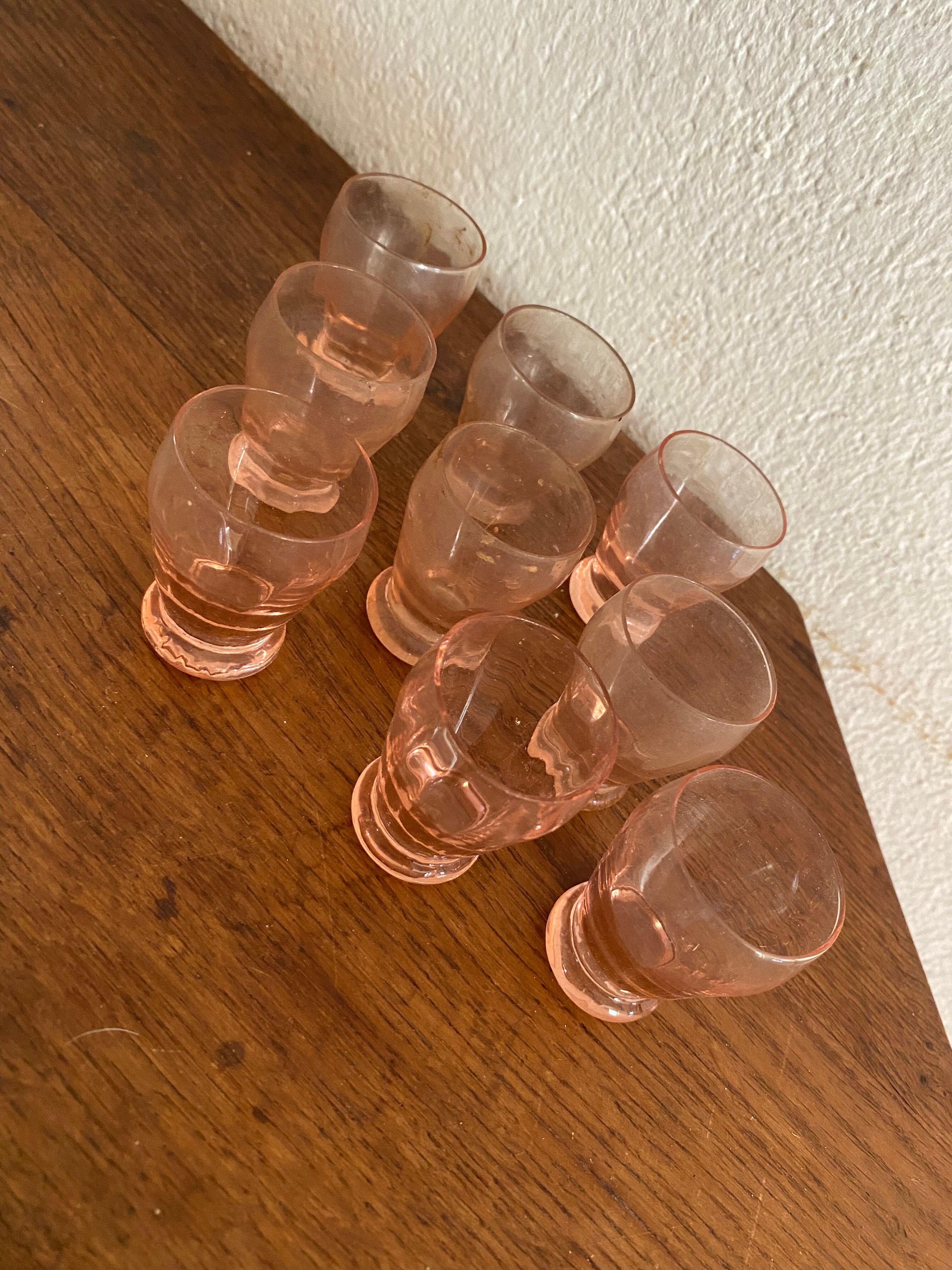 9 glasses vintage liqueur with pink glass.