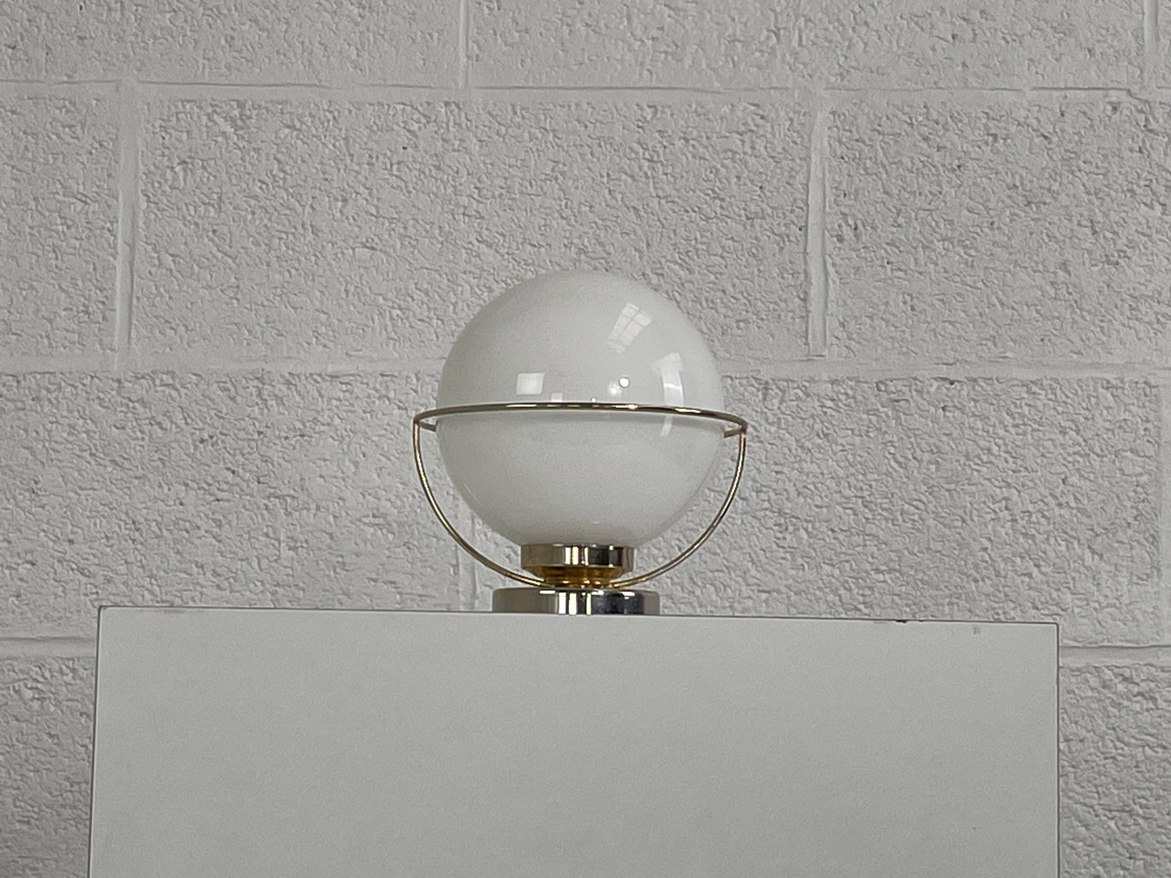 brass wall light from the 50s