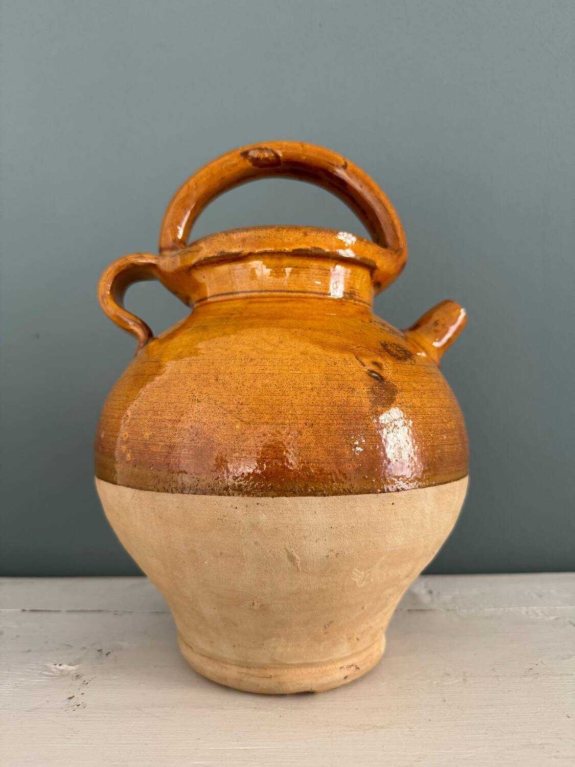 Old terracotta gargoulette jug