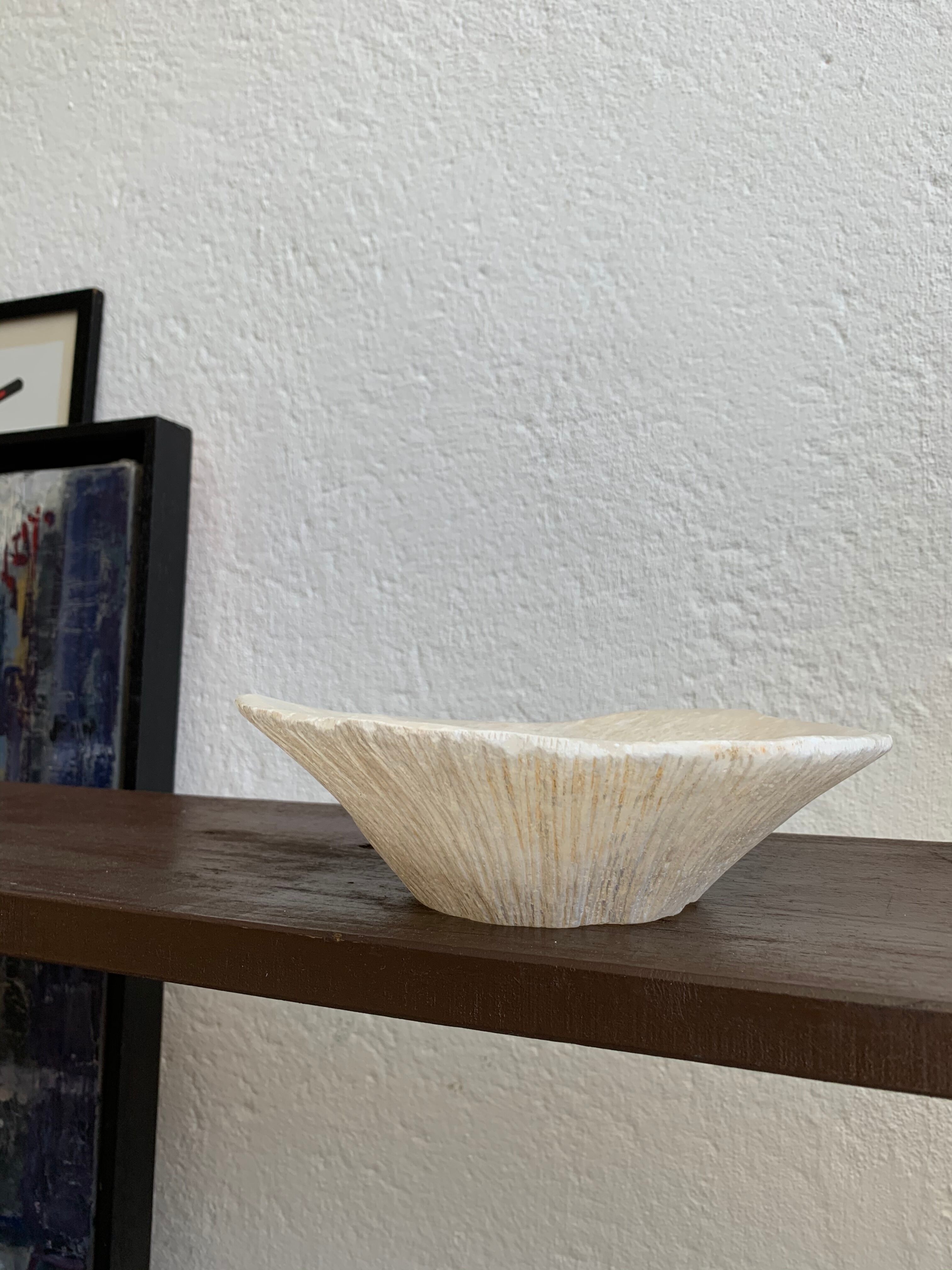 Empty pocket in vintage alabaster