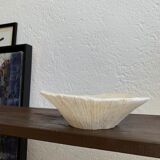 Empty pocket in vintage alabaster