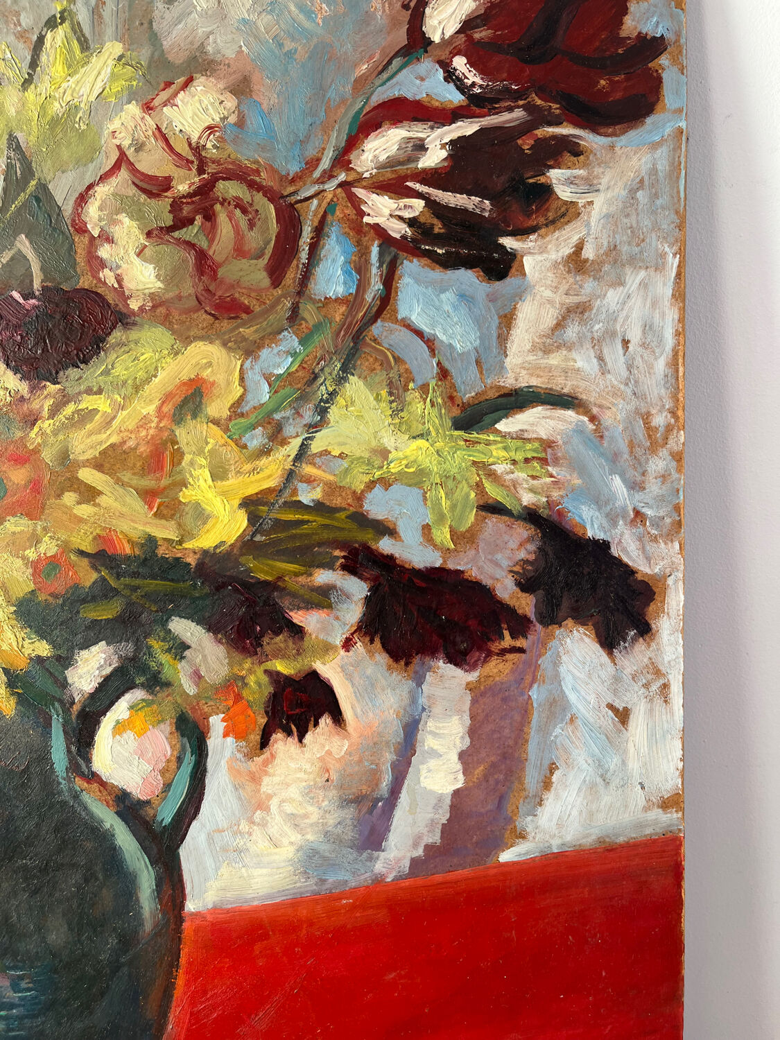 Bouquet of flowers on a red tablecloth, knife on a board, signed Renzo.