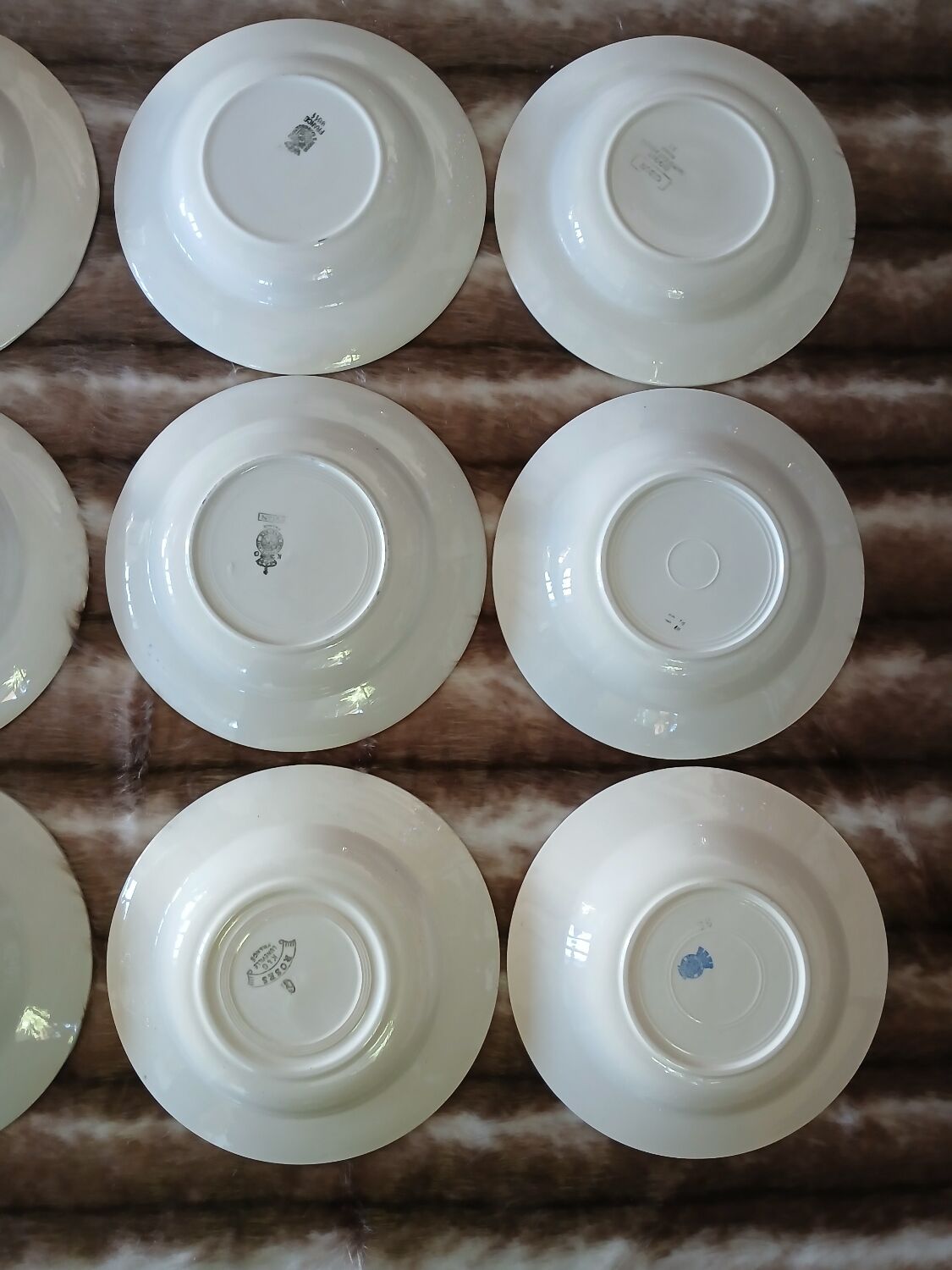 16 mismatched antique deep plates