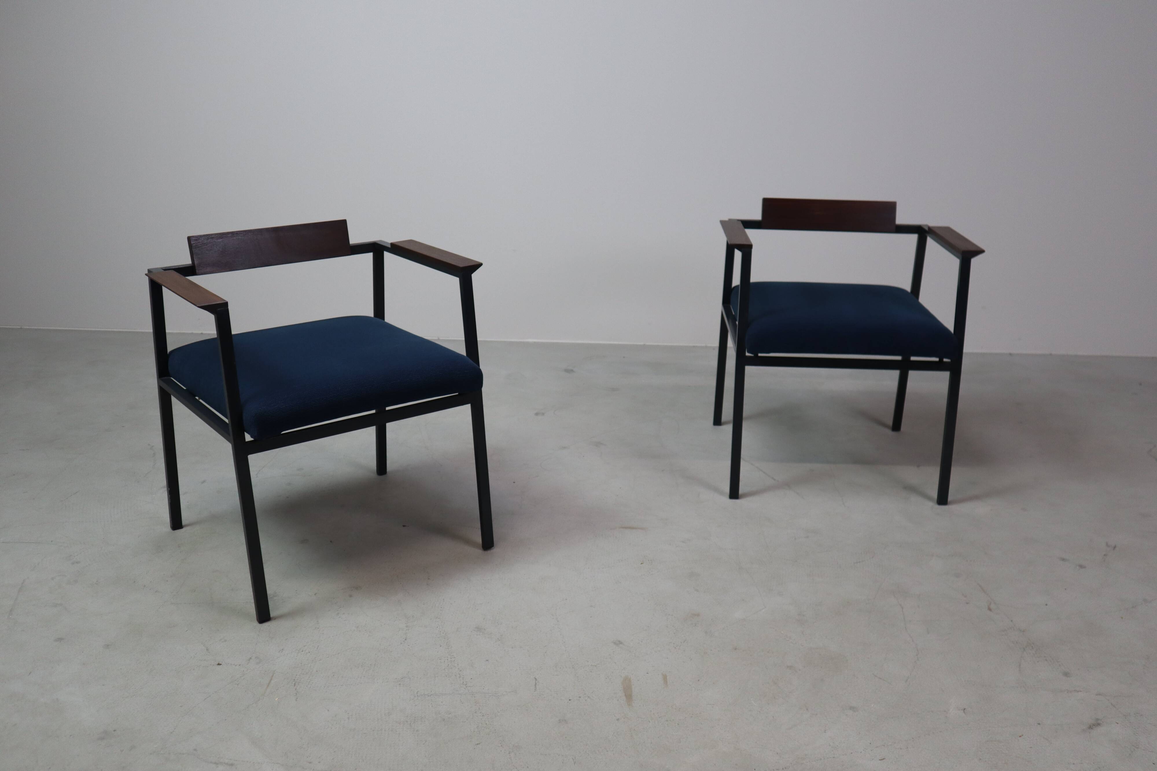Pair of Postmodern armchairs in steel and mahogany, 1970s