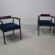 Pair of Postmodern armchairs in steel and mahogany, 1970s