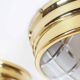 Pair of vintage brass ceiling lights with glass globe