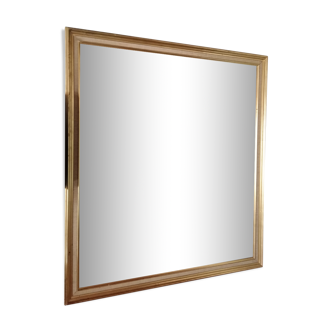 Golden mirror with leaf