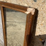 Miroir ancien en bois et stuc doré forme allongée moulure fine