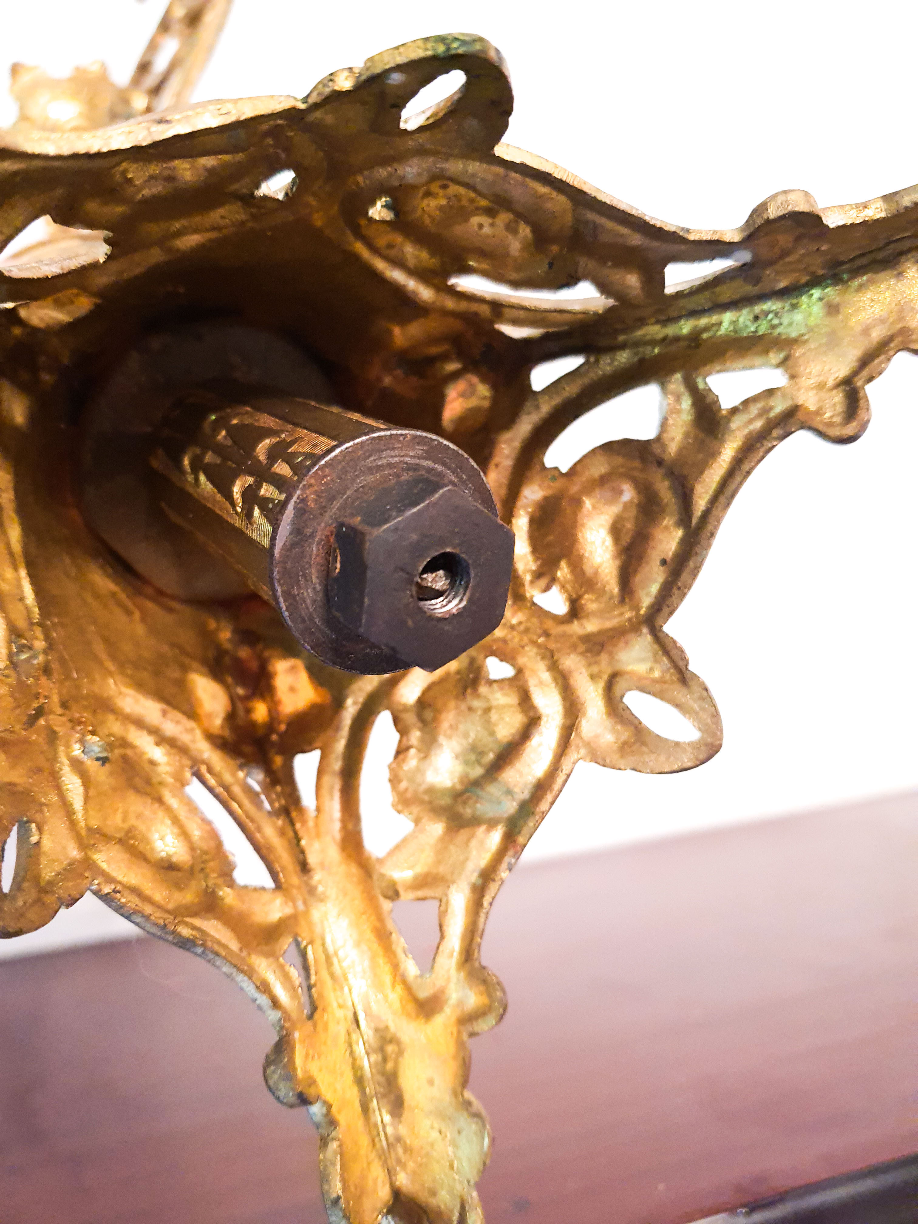 Pair of candlesticks Rocaille in gilded bronze