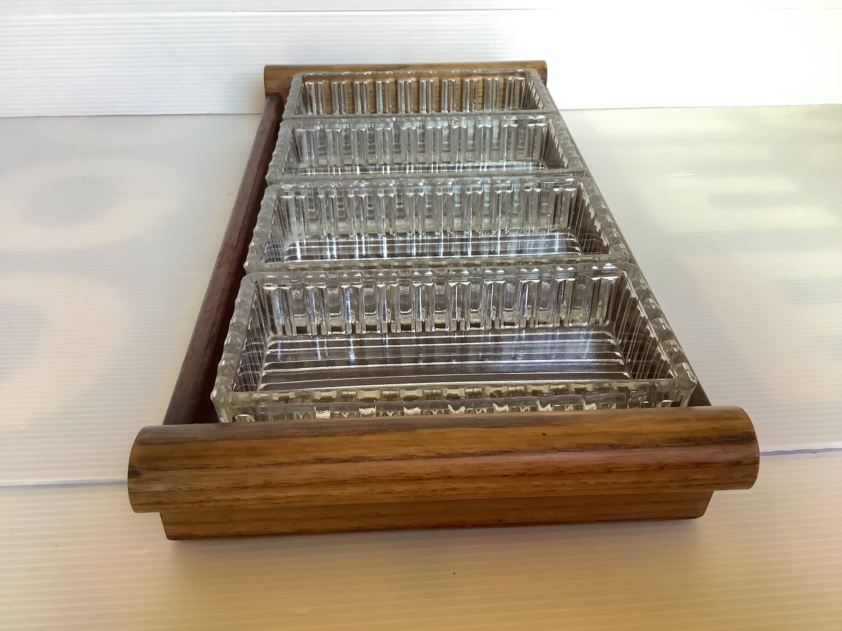 Old wooden serving tray and molded glass bowls