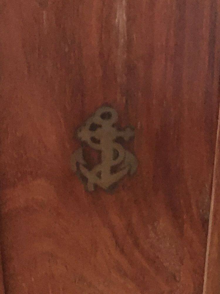 Key box in wood and brass and central motif representing a sailor's anchor