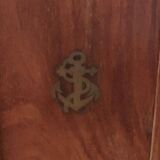Key box in wood and brass and central motif representing a sailor's anchor