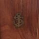 Key box in wood and brass and central motif representing a sailor's anchor