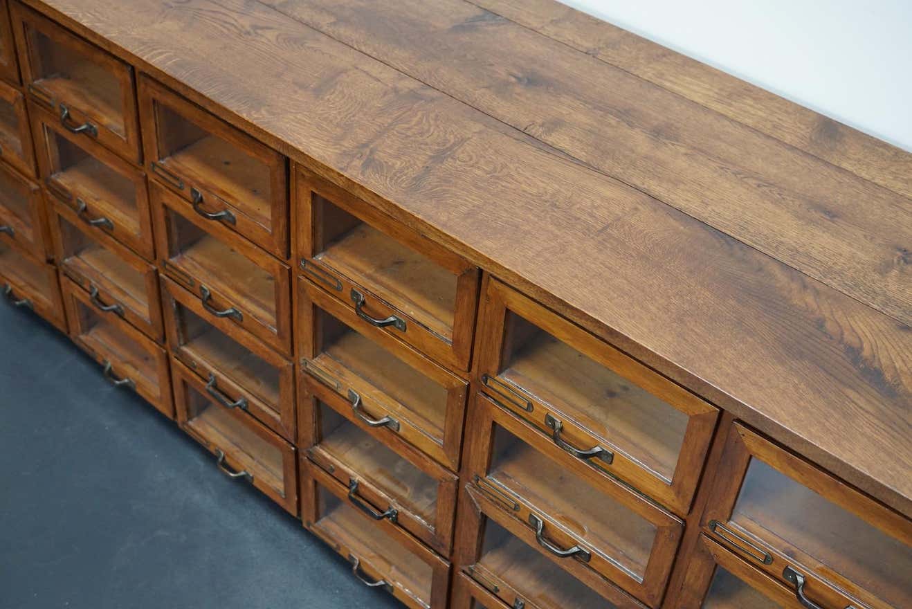 Vintage dutch oak haberdashery cabinet 1930s