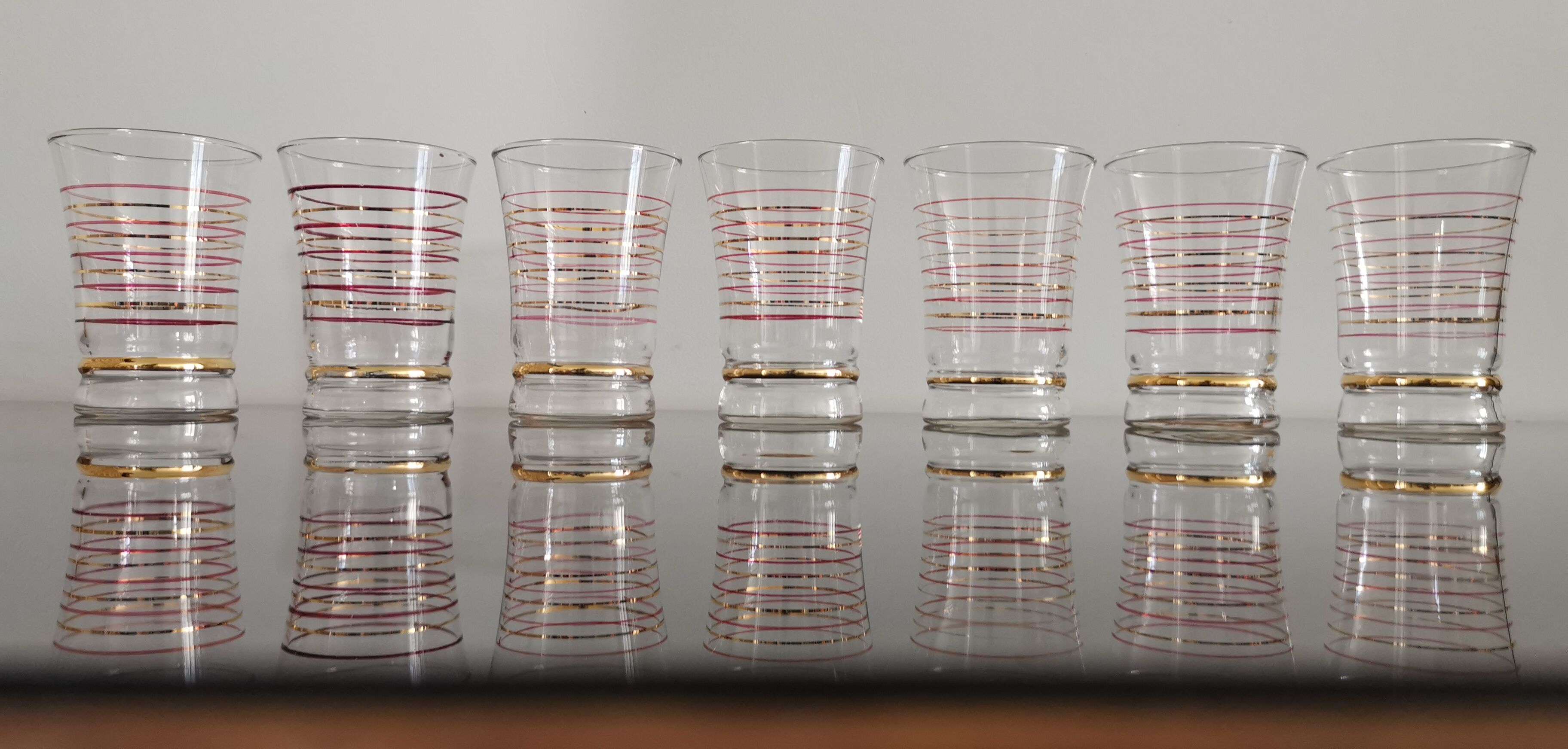 Set of 7 vintage glasses bordered gold and red years 50/60