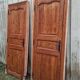 Pair of double-sided communication doors in chestnut with their frame - 20th century