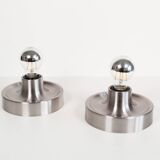 Pair of petite Disc sconces selected by Charlotte Perriand for Les Arcs