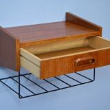 Dutch wall shelf by Tomado in teak and metal, 1960s.