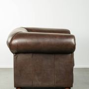 Set of a smooth chesterfield sofa and armchair with a timeless English look