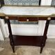 Console de style Louis XVI dessus marbre