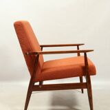 Scandinavian design curly orange armchair by H.Lis