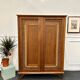 Armoire rotin pieds compas