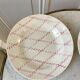 set of 4 hollow plates Badonviller pink rope pattern 30s