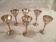Set of 6 mini goblets on a pedestal in Art Deco style made of silver-plated metal with crests.