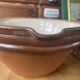 Antique spouted jug in terracotta