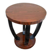 A round Art Deco coffee table made of beech wood and rosewood.