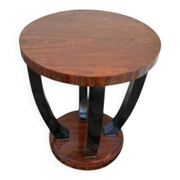 A round Art Deco coffee table made of beech wood and rosewood.