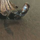 Large pagoda lamp painted with floral patterns and metal shade.