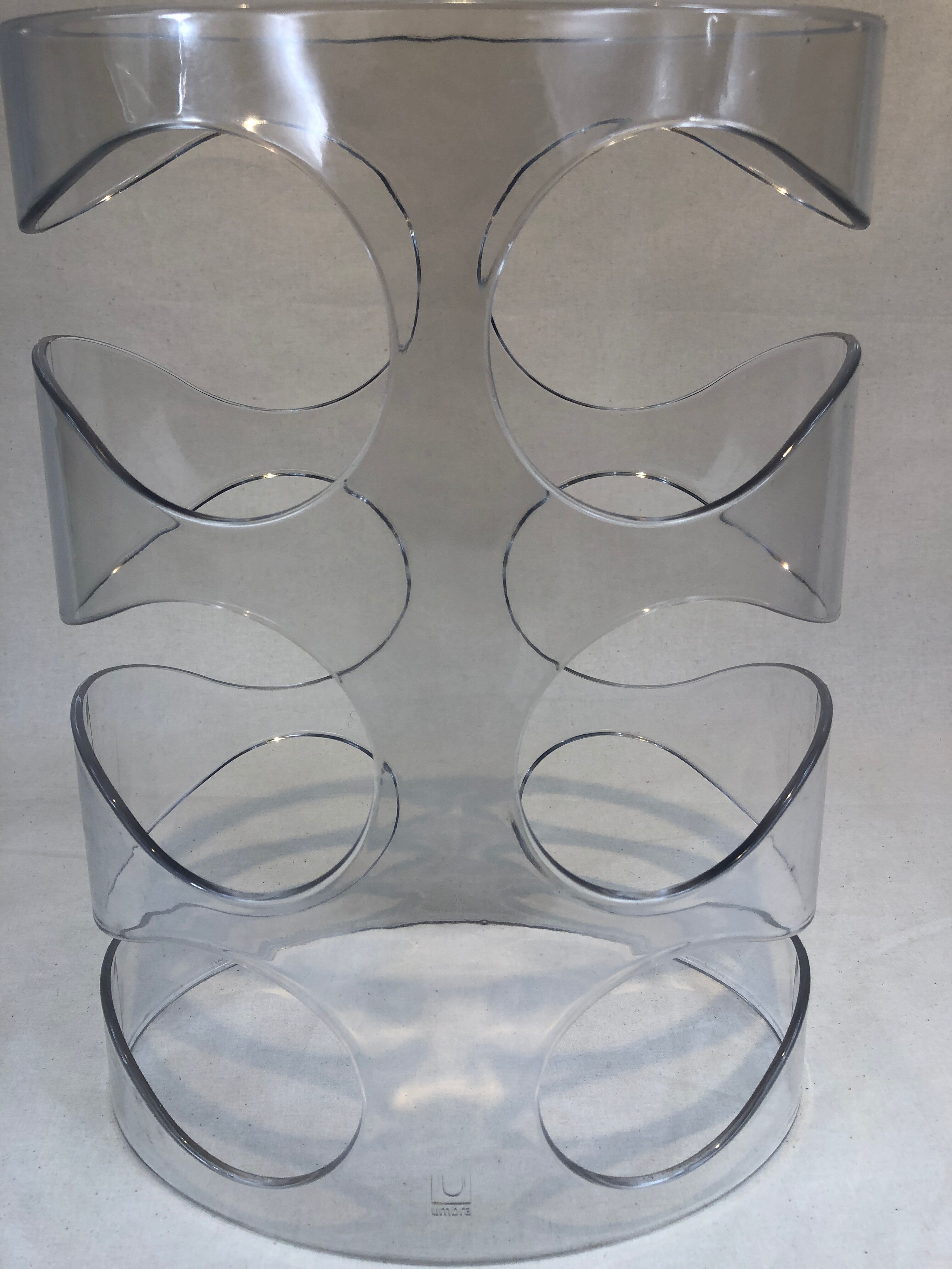 Transparent plexiglass bottle holder Umbra design Ran Lerner