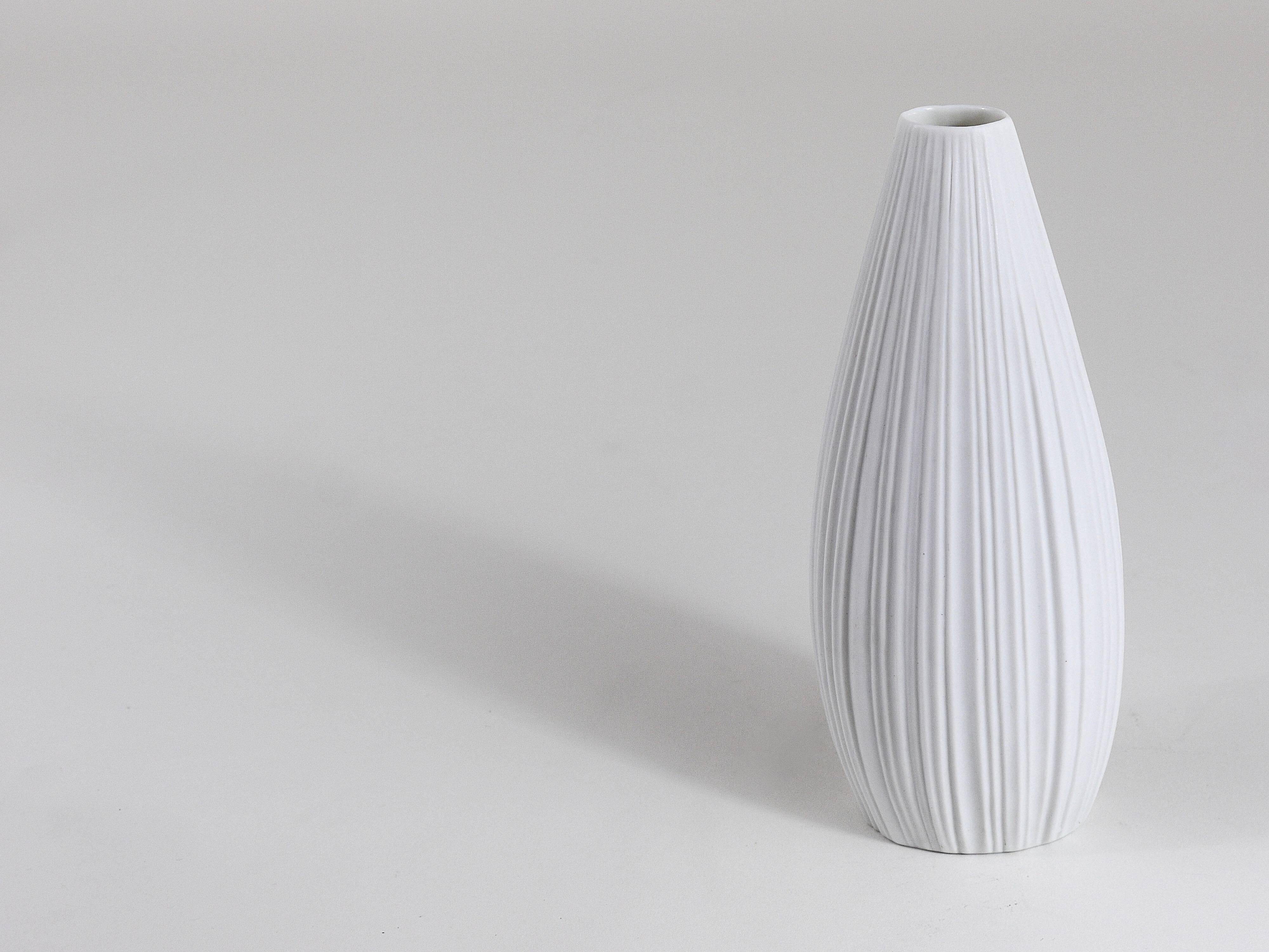 White porcelain vase with striped relief by Rosenthal, designed by Martin Freyer, Germany, 1960s.