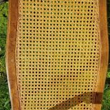Former seat, wood and caning.