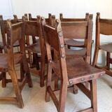 Set of 8 walnut and leather chairs from the 1950s