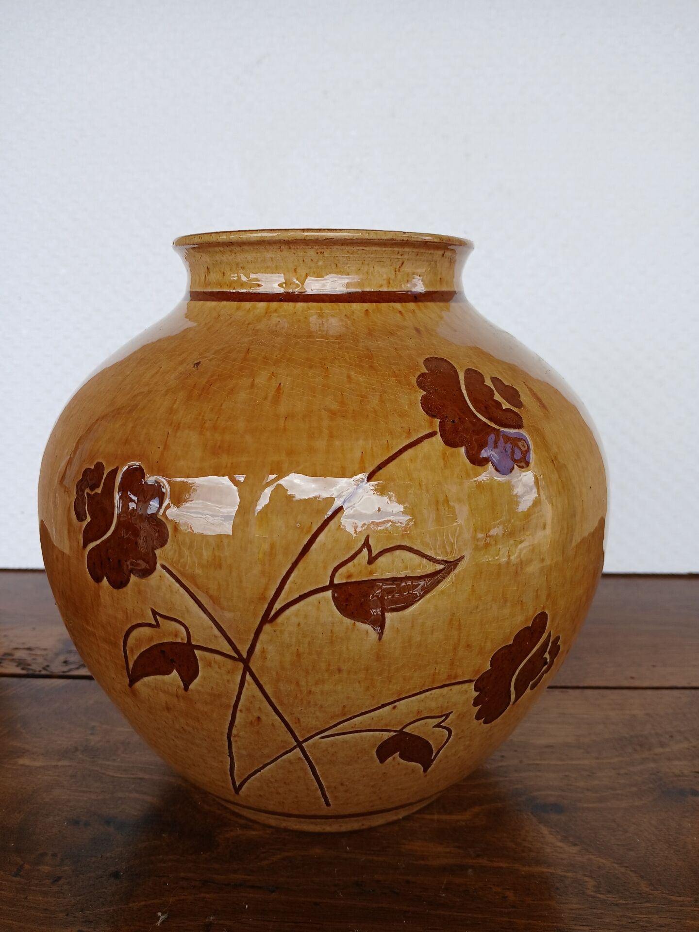 Vintage glazed vase with floral decoration signed Nigon.