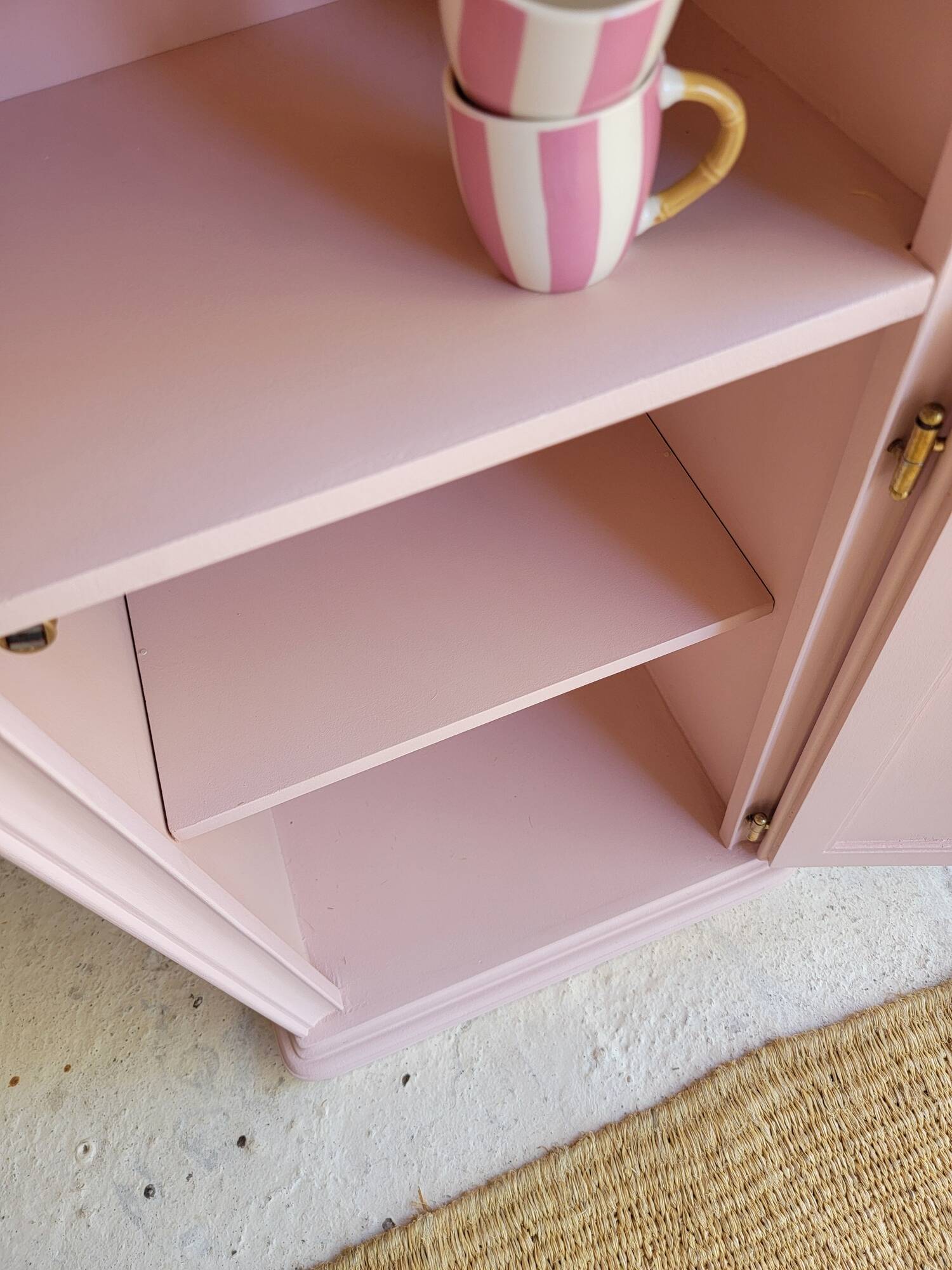 Antique bedside table revamped in pink.