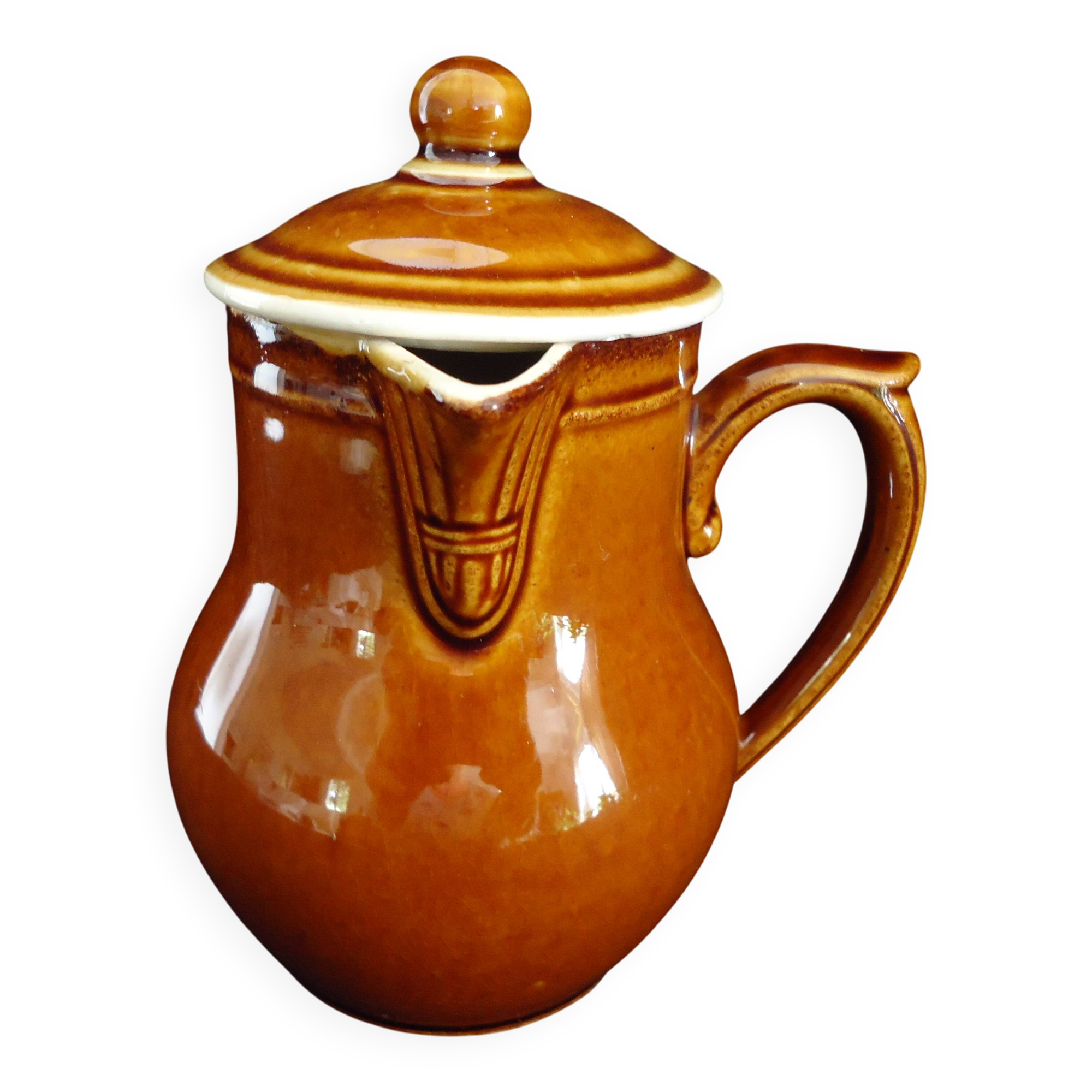 Old covered milk jug, side handle