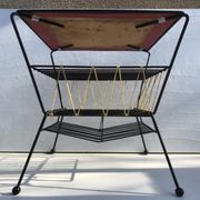 Old coffee table with black metal and scoubidou magazines holder