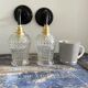 Pair of vintage electrified glass wall lamps