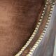 Art Deco design armchair finished in velvet and fitted with decorative nails